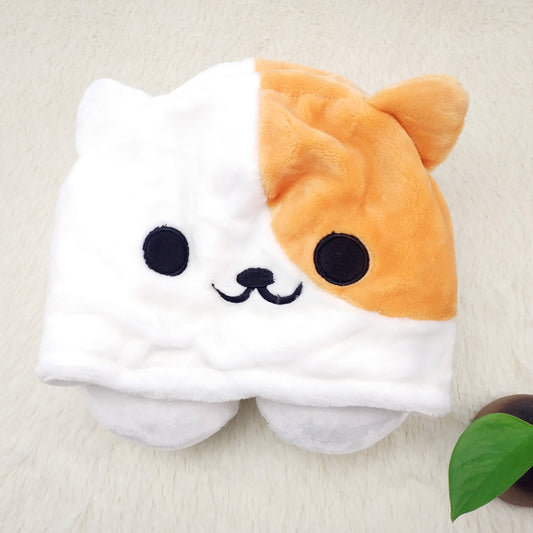 An adorable plush hat designed in the shape of a puppy.
